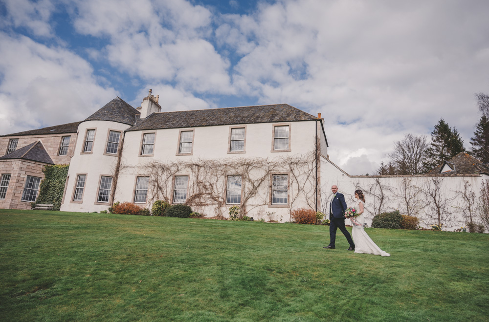 View of the front of Logie Country House during Tim and Sally's wedding photo shoot